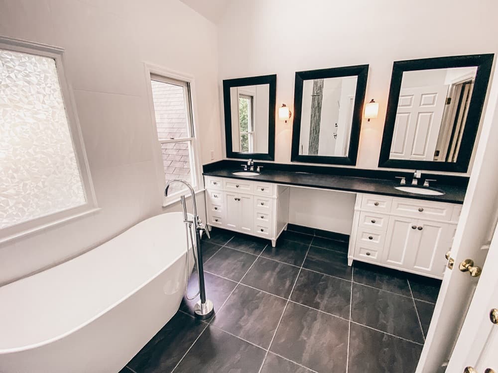 Bathroom countertop installation with freestanding tub