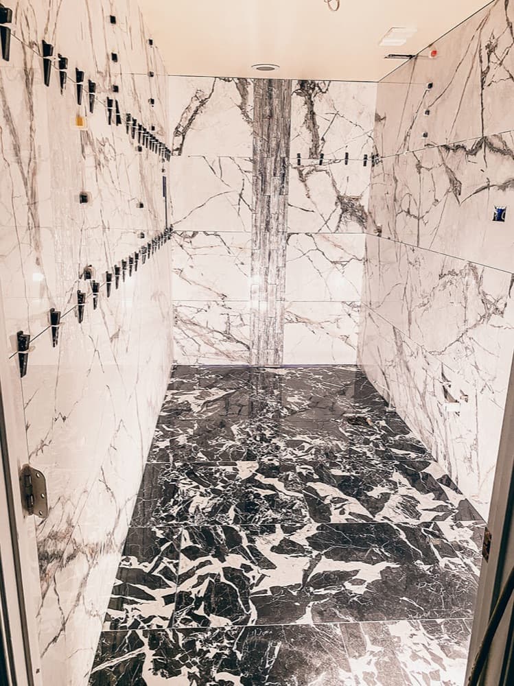Marble bathroom countertop and shower installation